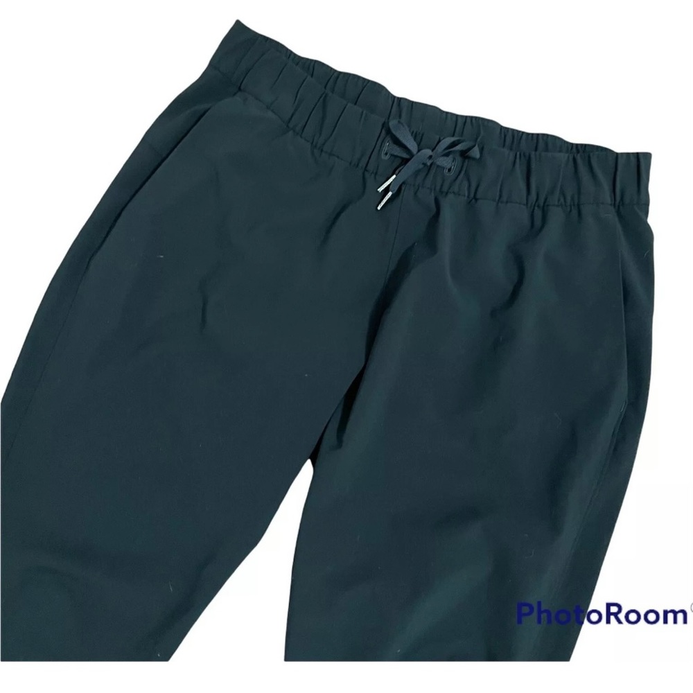 Lululemon On the Fly Pant 28" Woven Black Athletic Travel Elastic Waist Sz 12